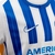 Camisa Brighton Home I 24/25 Torcedor Nike Masculino - Branco e Azul na internet