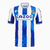 Camisa Real Sociedad Home 22/23 Torcedor Macron Masculina - Branco + Azul