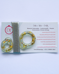 Pullring transparente e brilhos dourado