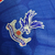 Camisa Crystal Palace I 23/24 - Jogador Macron Masculina - Vermelha e azul com detalhes em branco - loja online