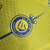 Camisa Al-Nassr I 23/24 - Jogador Nike Masculina - Amarela com detalhes em azul - loja online