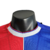 Camisa Crystal Palace I 23/24 - Jogador Macron Masculina - Vermelha e azul com detalhes em branco