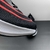 Imagem do Tênis Nike Zoom Fly 4 - Preto com detalhes em roxo e laranja