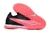 Chuteira Nike Phantom GX Society TF - Rosa com detalhes em preto