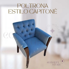 Poltrona azul estilo capitoné