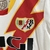 Kit Infantil Rayo Vallecano I 23/24 Umbro - Branco com detalhes em amarelo e vermelho - tienda online