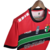 Image of Camisa Desportivo Palestino Edição Especial 22/23 - Torcedor Capelli Masculina - Vermelha com detalhes em verde e preto