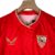 Kit Infantil Sevilla II Castore 23/24 - Vermelho com ondulações cinza e dourado en internet