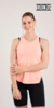 MUSCULOSA DEPORTIVA CALADA SALMON FLUOR - IROIKOS | Ropa deportiva de mujer: Calzas, tops y remeras