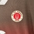 Camisa FC St Pauli I 23/24 - Torcedor Diiy Masculina - Marrom com detalhes em vermelhos e branco - loja online
