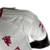 Imagem do Camisa Manchester United III 23/24 - Jogador Adidas Masculina - Branca com detalhes em vermelho e preto