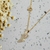 Colar Dourado com Pingente de Coração com Pérola e Zircônias - Tittanium | Semijoias e Prata 925