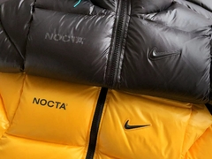 Nocta x Nike Jaqueta Puffer Yellow - comprar online