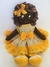 Boneca negra vestido floral amarelo