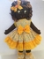 Boneca negra vestido floral amarelo - comprar online