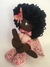 Boneca negra sentadinha estampa rosa - comprar online