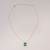 Colar Cristal Retangular de Letra no Dourado com Verde - comprar online