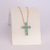 Colar Cruz de Cristais Verde no Elo Portugues no Dourado - comprar online