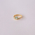 Anel Ondulado Trabalhado com Cristal Oval no Dourado com Verde - comprar online