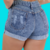Short Jeans Feminino Cintura Alto Destroyed Barra Dobrada - comprar online