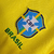 camisa-selecao-brasil-i-23-24-torcedor-nike-masculina-amarela-com-detalhes-em-verde