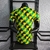 Camisa Arsenal Pré-Jogo 22/23 Jogador Adidas Masculina - Amarelo, preto e verde.