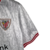 camisa-athletic-bilbao-iii-23-24-torcedor-castore-masculina-branca-com-detalhes-em-vermelho-e-preto