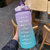 Garrafa 2L água com adesivos e canudo para academia - loja online