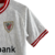 kit-infantil-atletico-de-bilbao-iii-23-24-castore-branco-com-detalhes-em-vermelho-e-preto