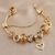 Pulsera de corazón dorado brillante para mujer