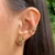 Brinco Ear Hook Cravejado em Zircônias Colors Banhado a Ouro - comprar online