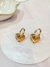 aretes de corazon spin