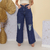 Calça Jeans Feminina Wide Leg Rasgada Lavagem Escura na internet