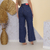 Calça Jeans Feminina Wide Leg Rasgada Lavagem Escura