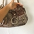 Bolsa Guess Vintage na internet