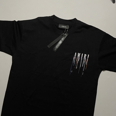 CAMISETA AMIRI “PAINT DRIP LOGO”