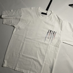 CAMISETA AMIRI “PAINT LOGO DRIP”