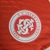 Imagem da nova camisa titular do Internacional 2024/25, com design vermelho e escudo bordado, confeccionada pela Adidas.