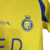 Kit Infantil Al-Nassr Titular I Nike 24-25 - Amarelo com detalhes em azul - Cristiano Ronaldo