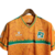 Camisa Seleção Costa do Marfim Edição Especial 22/23 - Torcedor Kelme Masculina - Laranja com detalhes em verde e branco on internet