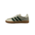 Tênis Adidas Gazelle na cor Semmy Green, com cabedal em couro e detalhes em verde.