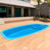 Piscina de fibra 5,80 metros oval com escada