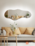 Espejo LED ARD Glanz Luminous Cloud de 120 x 55 cm, con un diseño moderno y elegante iluminando un ambiente acogedor.