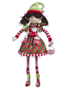 Muñeca duende divertida con falda blanca estampada y gorro verde, sosteniendo una esfera decorativa.