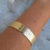 BRACELETE MARTELADO DOURADO