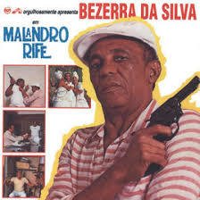 Bezerra Da Silva 1985 - Malandro Rife - Na compra de 10 álbuns musicais, 10 filmes ou desenhos, o Pen-Drive será grátis...Aproveite!
