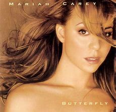 Mariah Carey 1987 - Butterfly - Na compra de 15 álbuns musicais, 20 filmes ou desenhos, o Pen-Drive será grátis...Aproveite!