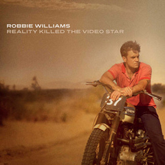 Robbie Williams 2009 - Reality Killed The Video Star - Na compra de 15 álbuns musicais, 20 filmes ou desenhos, o Pen-Drive será grátis...Aproveite!