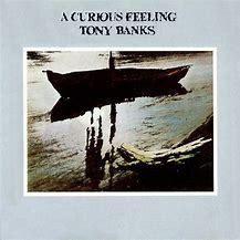 Tony Banks 1979 - A Curious Feeling - Na compra de 15 álbuns musicais, 20 filmes ou desenhos, o Pen-Drive será grátis...Aproveite!