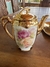 Conjunto café pequeno dourado tema floral na internet